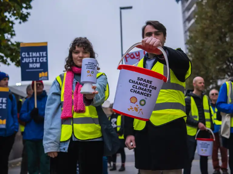 COP29: Campaigners ask Shell and BP for 'spare change for climate change'