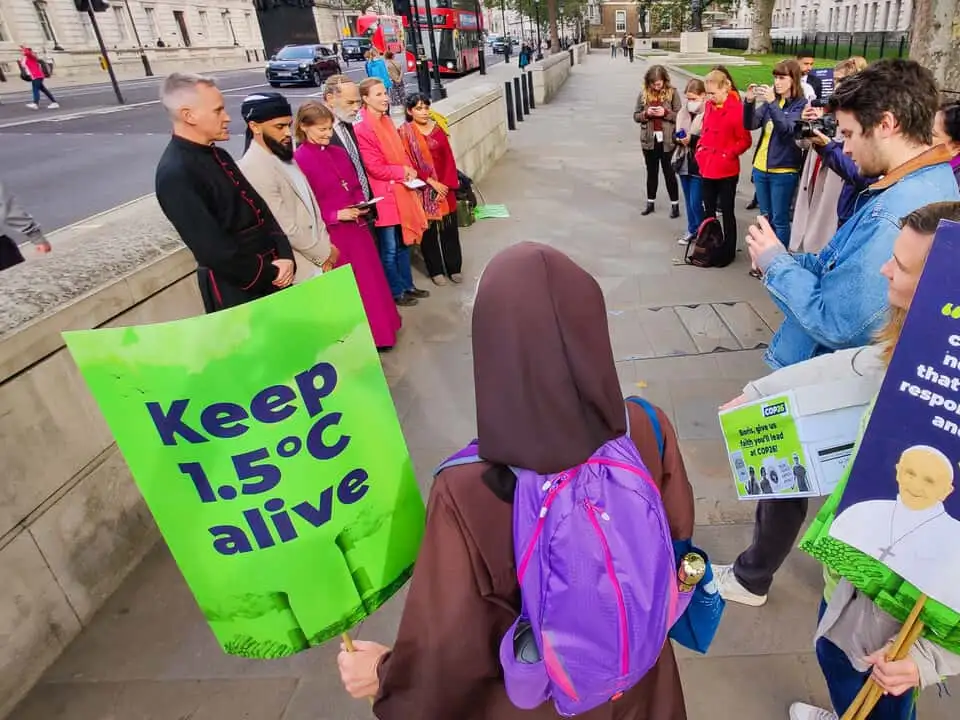 UK - Westminster - Faith leaders praying opposite Downing Street ahead of COP26