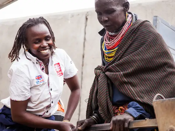Africa - Uganda - women at water pump - world water day